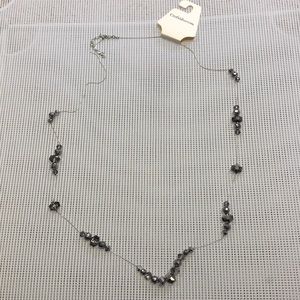 Long necklace with metallic beads